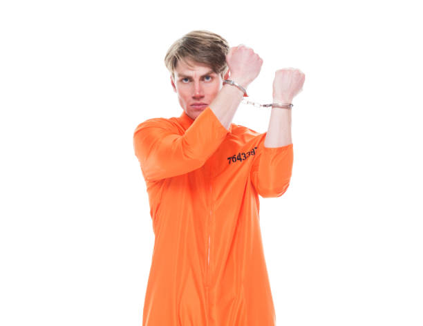 istock Male prisoner wearing handcuffs 1152281517