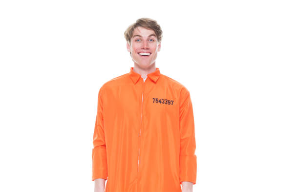 istock Male prisoner wearing orange jumpsuit 1152282061