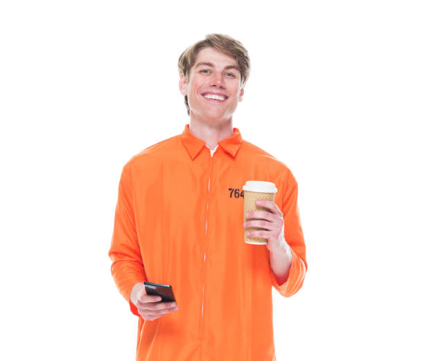 istock Male prisoner wearing orange jumpsuit 1152282070