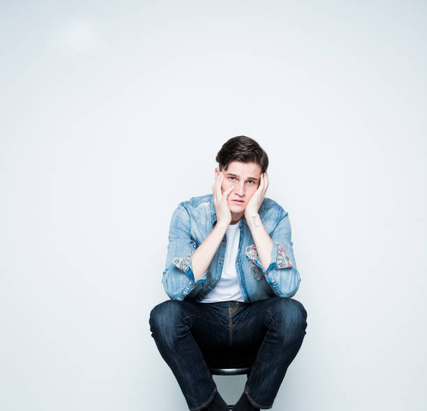 istock Handsome young man feeling depressed and sad 1152282279