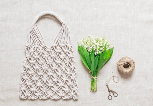 istock Handmade macrame bag on the linen background, ECO friendly 1152282703