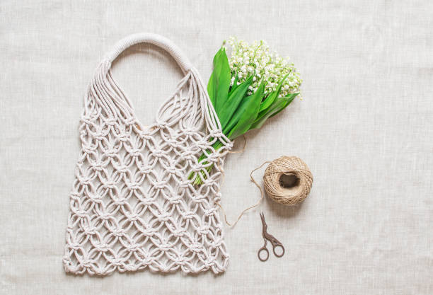 istock Handmade macrame bag on the linen background, ECO friendly 1152282724