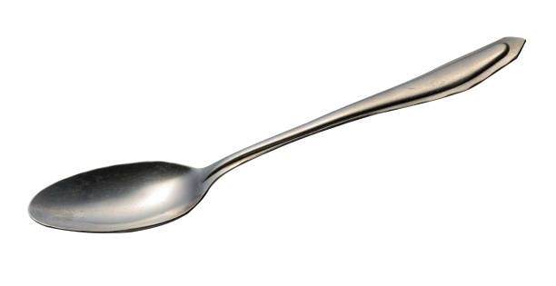 istock spoon isolated on white background. metal spoon. vintage spoon. 1152284167