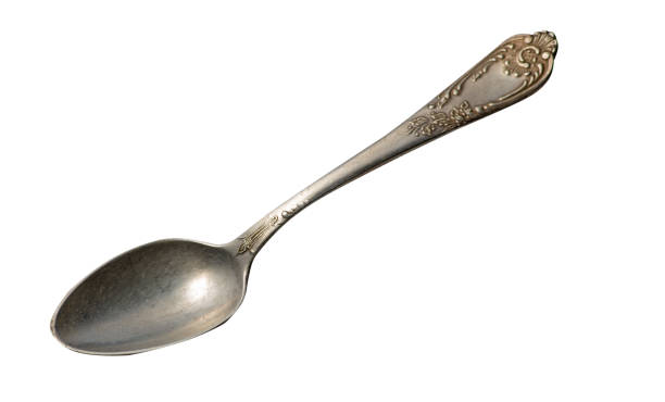 istock spoon isolated on white background. metal spoon. vintage spoon. 1152284168