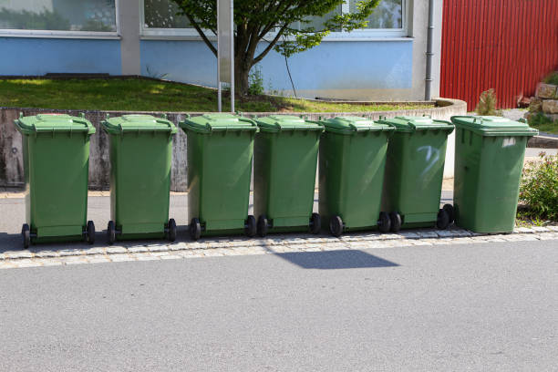 istock Green garbage cans are on the street 1152287106