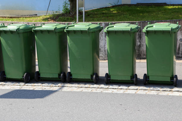 istock Green garbage cans are on the street 1152287118