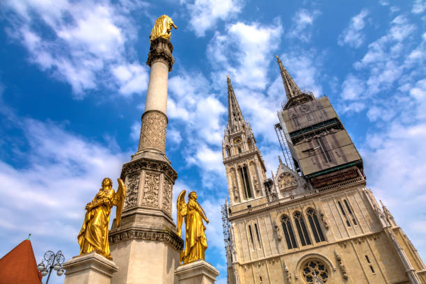 Virgin Mary’s pillar and Zagreb cathedral towers, view up
