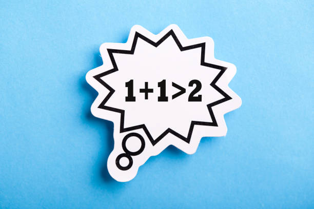 istock Synergy 1+1>2 Speech Bubble Isolated On Blue Background 1152289329