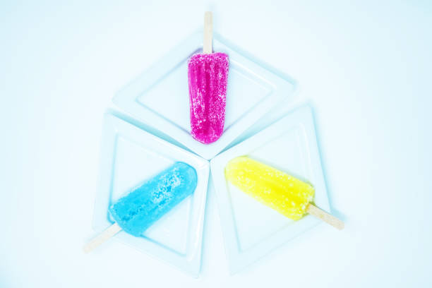 Coloured frozen popsicles