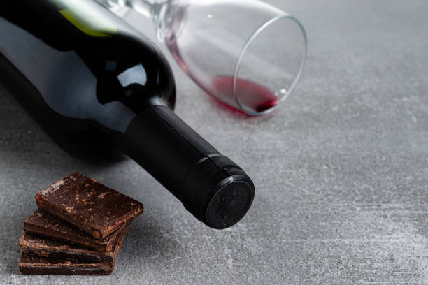 istock Wine and chocolate on concrete background. Copy Space 1152305132