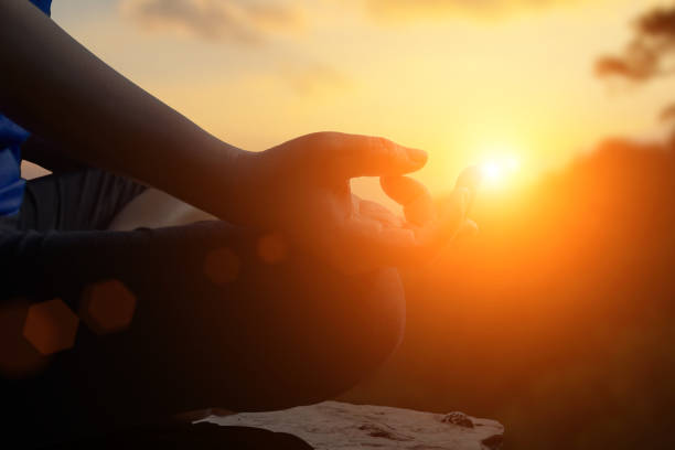 istock Young women meditate while doing yoga meditation. 1152319693