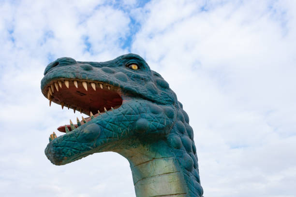dinosaur head with sharp teeth in outdoor in a day time