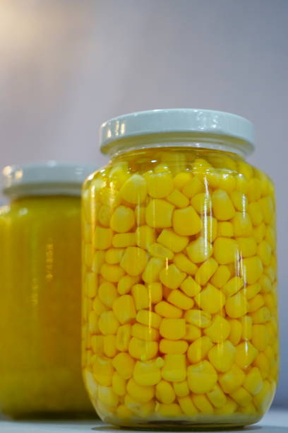 istock Preserved corn ear in glass jar 1152322727