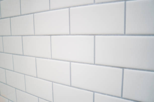 White subway tile with gray grout stock photo