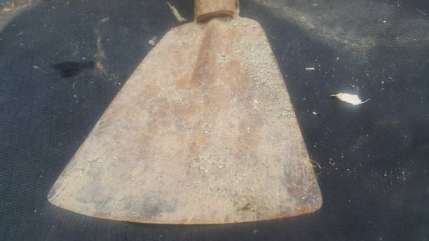 istock Trowel is old, rugged and dirty with mud. 1152325489