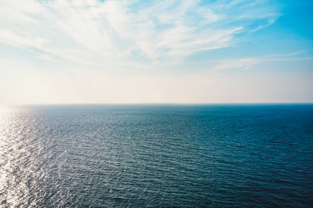istock Seascape with sea horizon and almost clear deep blue sky 1152326331