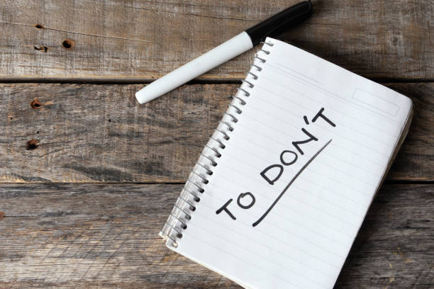 istock To don't word written with black marker on  notebook 1152328161