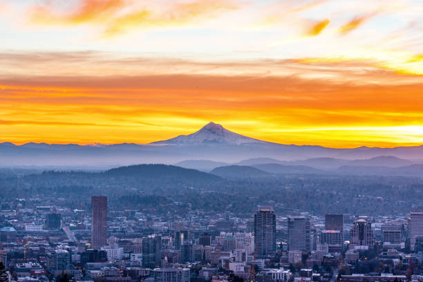 My Hood Raging Sunset Portland Oregon Raging sunset with Mt Hood godly looming over the city of Portland Oregon mt hood photos stock pictures, royalty-free photos & images