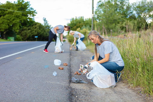 Group of Graduated College Students Doing Community Service Street and Roadside Cleanup (Shot with Canon 5DS 50.6mp photos professionally retouched - Lightroom / Photoshop - original size 5792 x 8688)