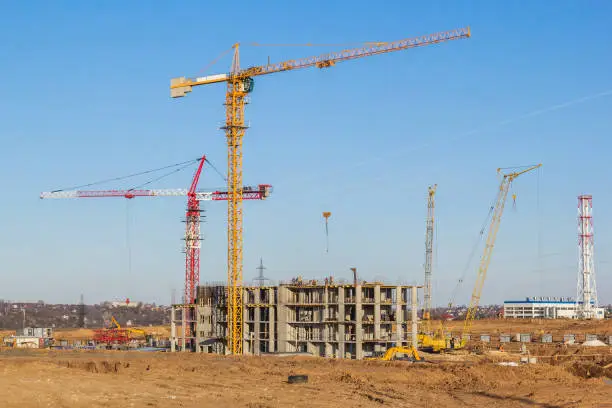 Cranes on a residential building construction site, Russia