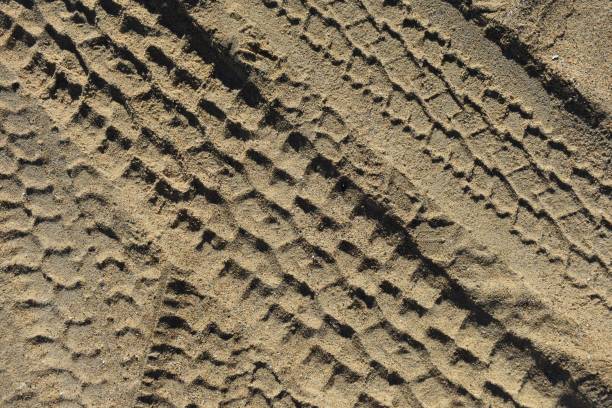 istock Four wheel drive tyre marks theme 1152330394