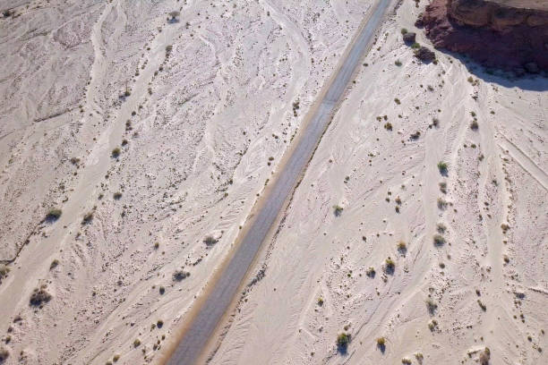 istock Old Desert road with cracked asphalt 1152330760