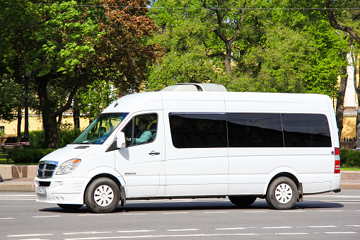 Saint Petersburg, Russia - May 25, 2013: White passenger van Dodge Sprinter 2500 in the city street.
