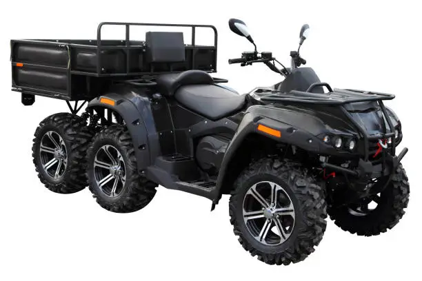 Photo of Modern ATV with a trailer for the transport.