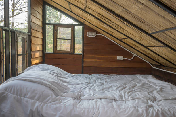 istock White Bed and Work Table in Country Loft Interior Design Room Floor 3 1152346251