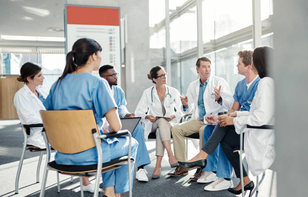 istock Discussing ways to better their hospital 1152347356