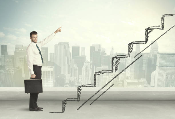 istock Business man climbing up on hand drawn staircase concept 1152348709