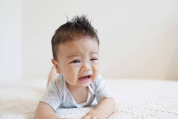 istock Baby boy having tummy time 1152349884