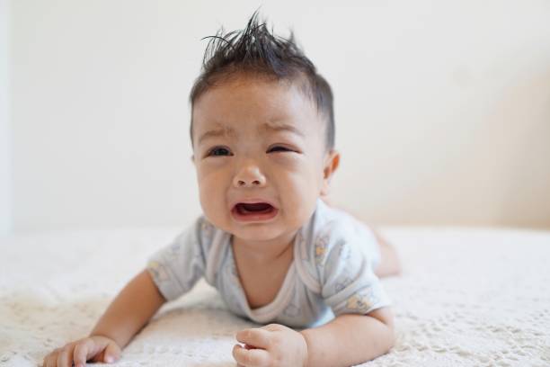 istock Baby boy having tummy time 1152349885