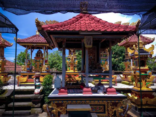 Balinese Altar And Shrines In The Middle Of The Temple With Gold Color At Patemon Village, North Bali, Indonesia