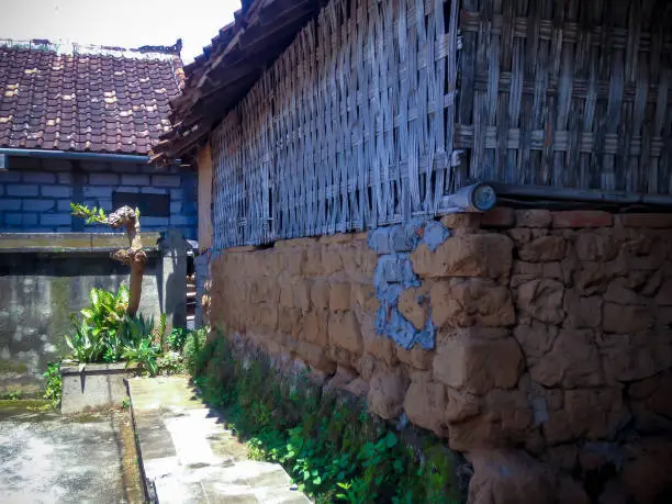 Ancient Wall Of Old Balinese House Building That Was Made Of Clay Piles