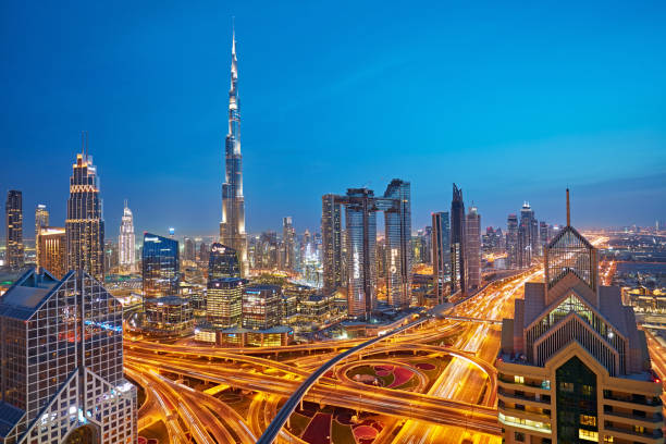 istock Dubai sky line with traffic junction at dusk 1152354178