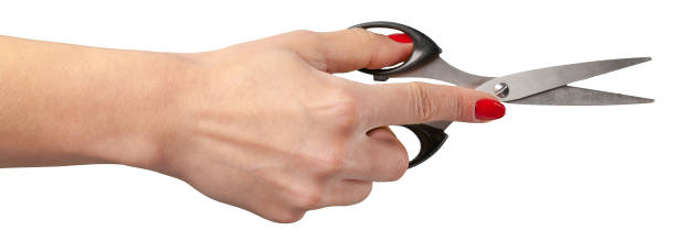 istock the hand of a Barber holding a scissors 1152357358