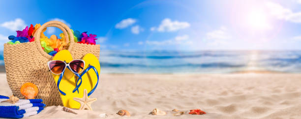 istock Summer holiday concept, beach accessories on white sand 1152362307
