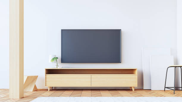istock tv wall  in living room / 3d rendering 1152363736