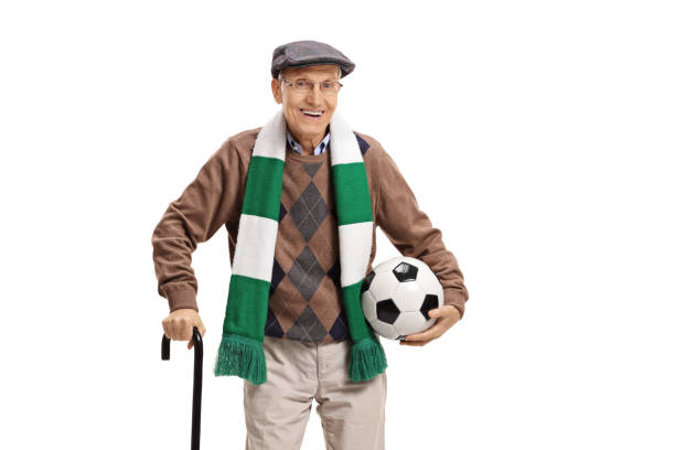 senior male soccer fan with a scarf and a football - fan sport football male imagens e fotografias de stock