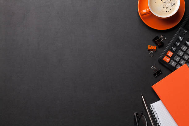 istock Office workplace with coffee, supplies and calculator 1152371197