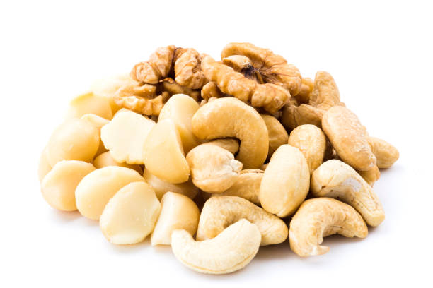 istock Variety of fresh nut on white background 1152372964