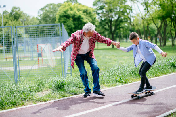 istock Little boy trying skateboard 1152372974