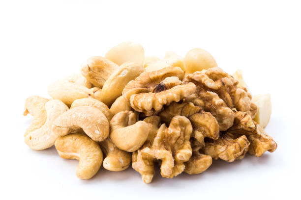istock Variety of fresh nut on white background 1152373127
