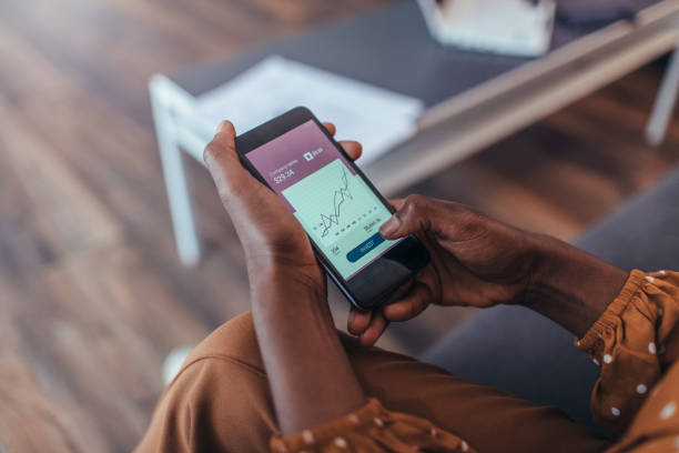 istock New Ways of Investing - Hands Only Using Smart Phone 1152373140