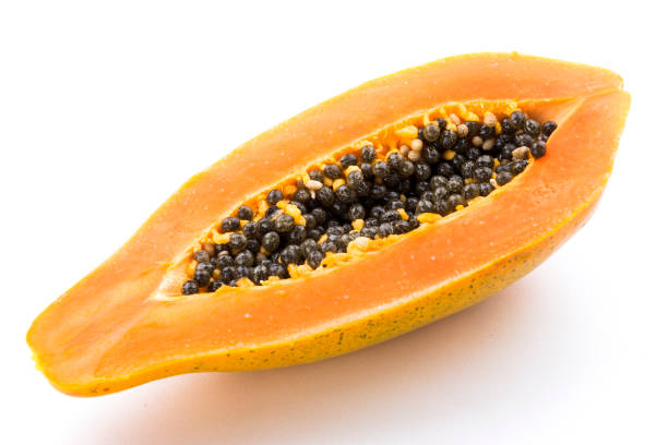 istock ripe papaya with half isolated on the white background. 1152373167