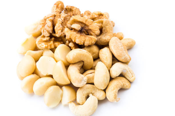 istock Variety of fresh nut on white background 1152373206