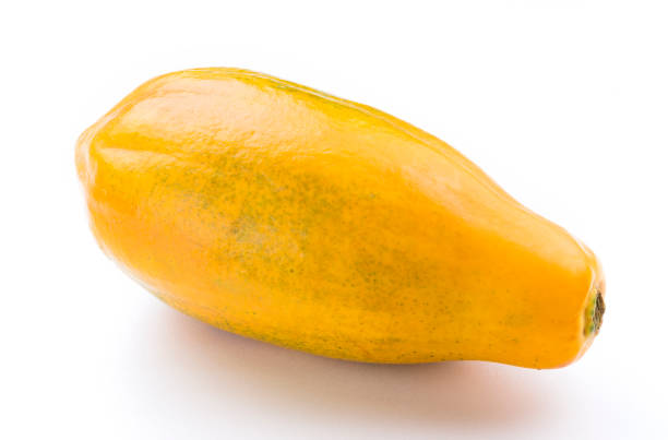 istock ripe papaya with half isolated on the white background. 1152373225