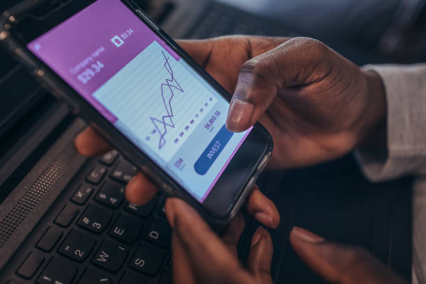 istock New Ways of Investing - Hands Only Using Smart Phone 1152373433