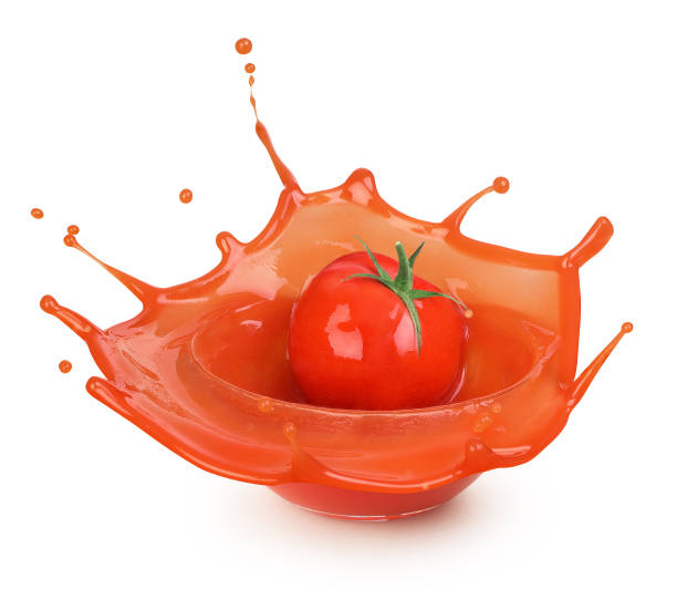 istock tomato sauce splash in glassware against white background 1152376522